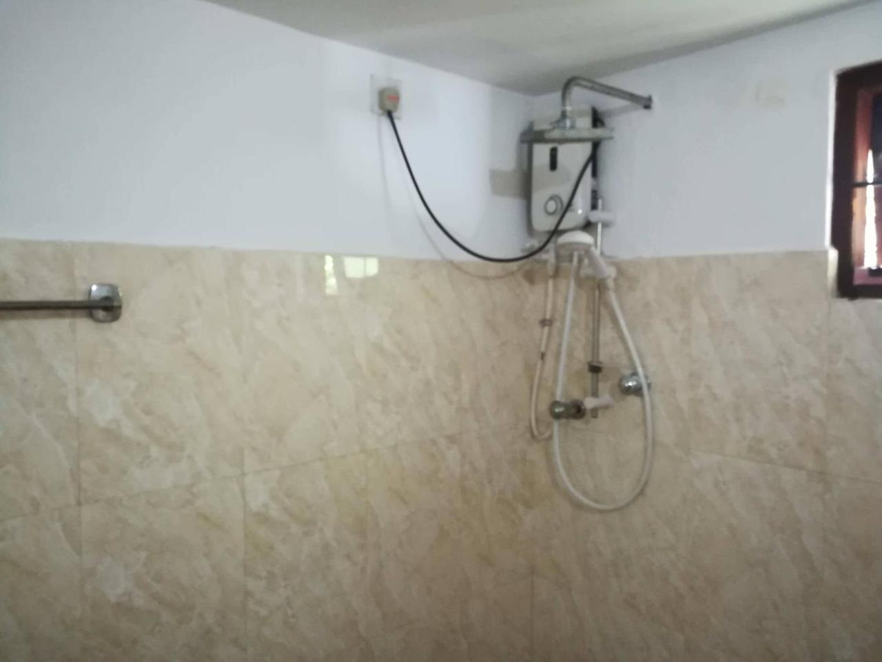 מיריסה Damith Tourist Inn מראה חיצוני תמונה